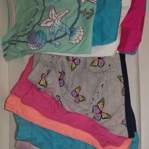 7 pairs of shorts and 4 t shirts